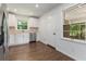 Modern eat-in kitchen with stainless steel appliances and white cabinets and tile backsplash at 174 Zelma Sw St, Marietta, GA 30060