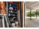 Practical storage area with shelving, supplies, and access to an outdoor covered space at 174 Zelma Sw St, Marietta, GA 30060