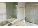 Bathroom vanity, sink, and shower with bathtub at 386 Teal Ct, Roswell, GA 30076