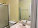 Bathroom with shower/tub, mirror, and sink at 386 Teal Ct, Roswell, GA 30076