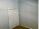 Bedroom with carpet and closet with white doors at 386 Teal Ct, Roswell, GA 30076