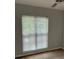 Bedroom interior with natural light and window view at 386 Teal Ct, Roswell, GA 30076