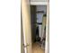 A storage closet offers shelving and ample space for organizing household items at 386 Teal Ct, Roswell, GA 30076