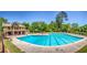 Community pool with large pool house in background at 386 Teal Ct, Roswell, GA 30076