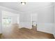 Elegant dining room features wainscoting and hardwood floors with an open layout at 4638 Arrow Wind Dr, Powder Springs, GA 30127