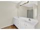 Bright bathroom featuring a large mirror, double vanity and ample counter space at 771 Franklin Mill Trce, Loganville, GA 30052