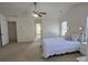 Bedroom features carpet, two windows and vaulted ceilings at 771 Franklin Mill Trce, Loganville, GA 30052