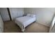 Small bedroom features carpet, natural light and double door closet at 771 Franklin Mill Trce, Loganville, GA 30052