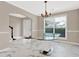 Bright dining room featuring new flooring, neutral walls, and modern decor at 771 Franklin Mill Trce, Loganville, GA 30052