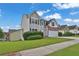 Beautiful two-story home with landscaped yard, and inviting curb appeal at 771 Franklin Mill Trce, Loganville, GA 30052
