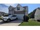 Well-maintained two-story home with brick facade and two-car garage at 771 Franklin Mill Trce, Loganville, GA 30052