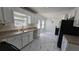 Bright kitchen with ample cabinet space and stainless steel sink at 771 Franklin Mill Trce, Loganville, GA 30052