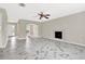 Spacious living room with fireplace, new flooring, and open floor plan at 771 Franklin Mill Trce, Loganville, GA 30052