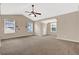 Bright main bedroom features neutral walls, carpeted floor, a vaulted ceiling and multiple windows at 771 Franklin Mill Trce, Loganville, GA 30052