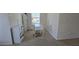 Home office features a white desk, natural light and neutral walls at 771 Franklin Mill Trce, Loganville, GA 30052