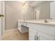 Bathroom featuring dual sinks, vanity area, and large mirror at 1505 September Chase, Decatur, GA 30033