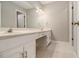 Bathroom featuring dual sinks, vanity area, and large mirror at 1505 September Chase, Decatur, GA 30033