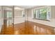 Bright dining area showcasing beautiful wood floors and a bay window with natural light streaming in at 1505 September Chase, Decatur, GA 30033