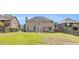 Expansive backyard with a mix of lush grass and a fenced perimeter at 3327 James Harbor Way, Lawrenceville, GA 30044