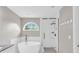 Modern bathroom with soaking tub and walk-in shower at 3327 James Harbor Way, Lawrenceville, GA 30044