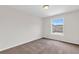 Bedroom featuring neutral carpet and a view at 3327 James Harbor Way, Lawrenceville, GA 30044