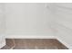 Walk-in closet with wire shelving and neutral carpet; great storage space at 3327 James Harbor Way, Lawrenceville, GA 30044