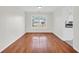 Bright dining room with hardwood floors and natural light at 3327 James Harbor Way, Lawrenceville, GA 30044