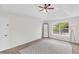 Bright main bedroom with vaulted ceiling, neutral carpet, and natural light at 3327 James Harbor Way, Lawrenceville, GA 30044