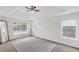 Spacious main bedroom with vaulted ceiling, carpet, and ample natural light at 3327 James Harbor Way, Lawrenceville, GA 30044