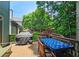 Spacious back deck with outdoor dining area, perfect for barbecues and entertaining guests at 3740 Ashford Ne Pt, Brookhaven, GA 30319