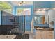 Modern bathroom featuring a glass shower, soaking tub, and sleek vanity with elegant granite countertops at 3740 Ashford Ne Pt, Brookhaven, GA 30319