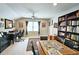 Spacious bedroom with a ceiling fan, and a large bookcase at 3740 Ashford Ne Pt, Brookhaven, GA 30319