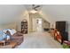 Bonus room with a bookshelf and television offers a versatile space for relaxation or entertainment at 3740 Ashford Ne Pt, Brookhaven, GA 30319