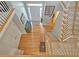 Bright, open foyer with hardwood floors, a staircase, and a clear view of the front door at 3740 Ashford Ne Pt, Brookhaven, GA 30319