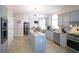 Charming eat-in kitchen with granite countertops, stainless steel appliances, and lovely breakfast area at 3740 Ashford Ne Pt, Brookhaven, GA 30319