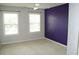 Bright bedroom with dual windows, a ceiling fan, and neutral carpet at 4020 Alligator Pt, Cumming, GA 30028