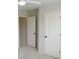 Cozy bedroom with neutral carpet, white trim, and a ceiling fan for added comfort at 4020 Alligator Pt, Cumming, GA 30028