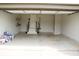 Spacious garage with ample storage space and high ceilings for organization at 4020 Alligator Pt, Cumming, GA 30028