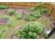 Aerial view of a thriving vegetable garden with raised beds at 4020 Alligator Pt, Cumming, GA 30028