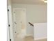 Hallway with carpeted floor and view through doors at 4020 Alligator Pt, Cumming, GA 30028