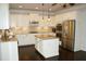Well-equipped kitchen featuring granite countertops, stainless steel appliances, and a kitchen island at 4020 Alligator Pt, Cumming, GA 30028