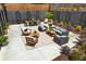 Expansive backyard with multiple seating areas, lush landscaping, and a well-designed patio at 591 E Morningside Ne Dr, Atlanta, GA 30324