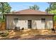 Private backyard with a small seating area and easy access to nature at 591 E Morningside Ne Dr, Atlanta, GA 30324