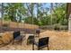 Outdoor patio with furniture, ideal for relaxing and entertaining in a private, fenced-in backyard at 591 E Morningside Ne Dr, Atlanta, GA 30324