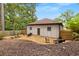 Backyard featuring a cozy seating area and landscaping, perfect for outdoor gatherings and relaxation at 591 E Morningside Ne Dr, Atlanta, GA 30324