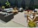 Cozy backyard patio seating arrangement with a mix of textures and comfortable lounging at 591 E Morningside Ne Dr, Atlanta, GA 30324