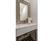 Stylish bathroom with a unique framed mirror, modern sink, and a clean, minimalist design at 591 E Morningside Ne Dr, Atlanta, GA 30324