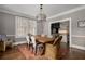 Stylish dining room connected to the kitchen, features a rustic wooden table at 591 E Morningside Ne Dr, Atlanta, GA 30324