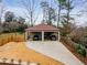 Spacious two-car garage with a large driveway, providing ample parking and storage space for vehicles at 591 E Morningside Ne Dr, Atlanta, GA 30324