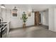 Cozy basement kitchen area with tile floors, stainless steel appliances, and brick accents at 591 E Morningside Ne Dr, Atlanta, GA 30324